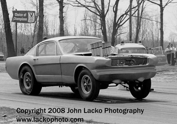 US-131 Motorsports Park - DICK BRANNANS 1966 AFX MUSTANG LEAVES THE LINE MAY 1966 FROM JOHN A LACKO WWW LACKOPHOTO COM